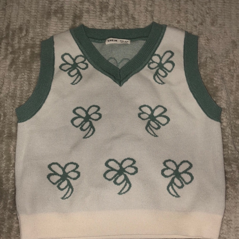 Green and white sweater vest
